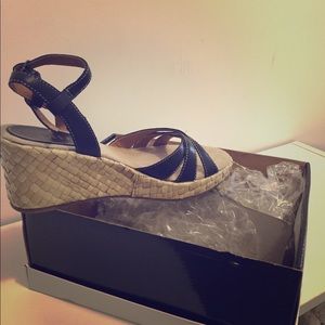 Wedge dress sandal with black leather straps